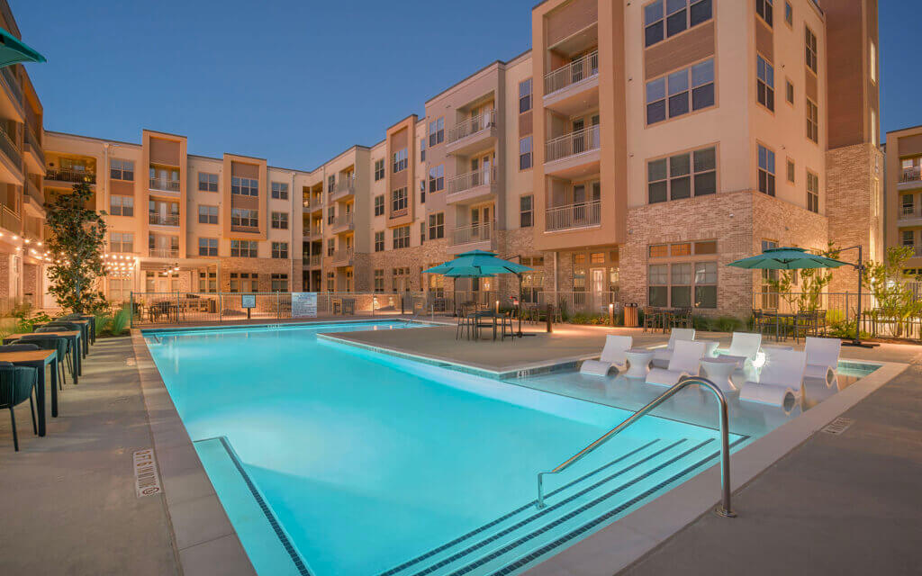 The Jovie at Pflugerville Pool at Dusk Photo 2